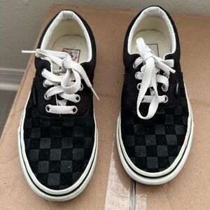 Vans Black and White Sneakers with Iconic Checkerboard Style